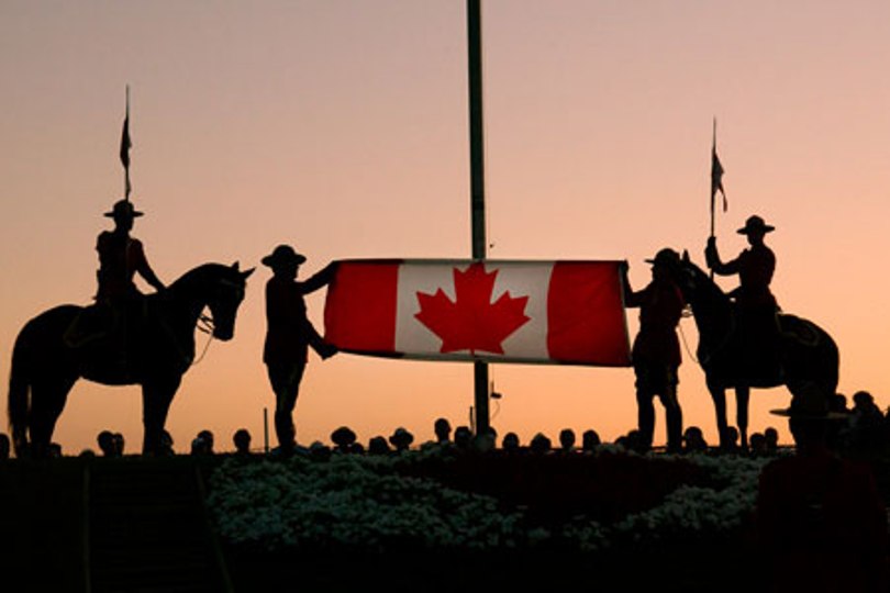Name:  Mounties raise Canadian Flag. .jpg
Views: 212
Size:  45.3 KB