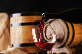 Name:  pouring_red_wine_bottle_glass_wooden_wine_casks_cg8p0728280c_th.jpg
Views: 83
Size:  9.4 KB