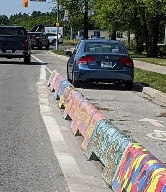 Name:  bike lane concrete barriers.jpg
Views: 73
Size:  70.3 KB