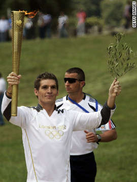 Name:  120510103535-olympic-torch-first-run-vertical-gallery.jpg
Views: 1099
Size:  14.0 KB