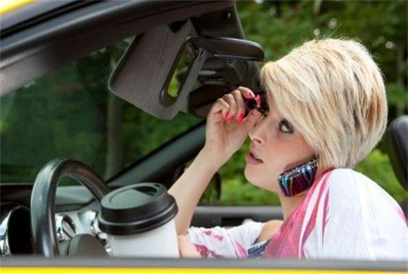 Name:  Woman_Distracted_Driving.jpg
Views: 99
Size:  30.0 KB