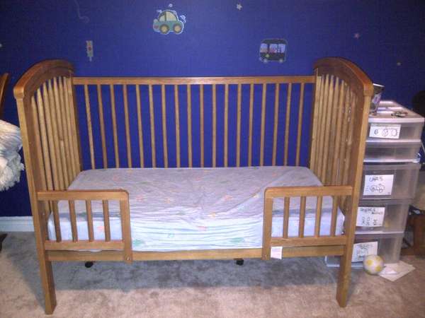IMG 20111231 00061. 4 in 1 convertable crib. Crib with one drop down side rail, coverts to toddler bed, day bed and double bed.  Has rails with locks to easily move around.  5 years old but only used for youngest (he's 2) for about a 1.5 yrs.  Picture shown is toddler bed.  Pick up in Angus - pls msg me for details.  $125