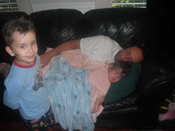 Daddy and summer sleeping - Nic  being miscievious